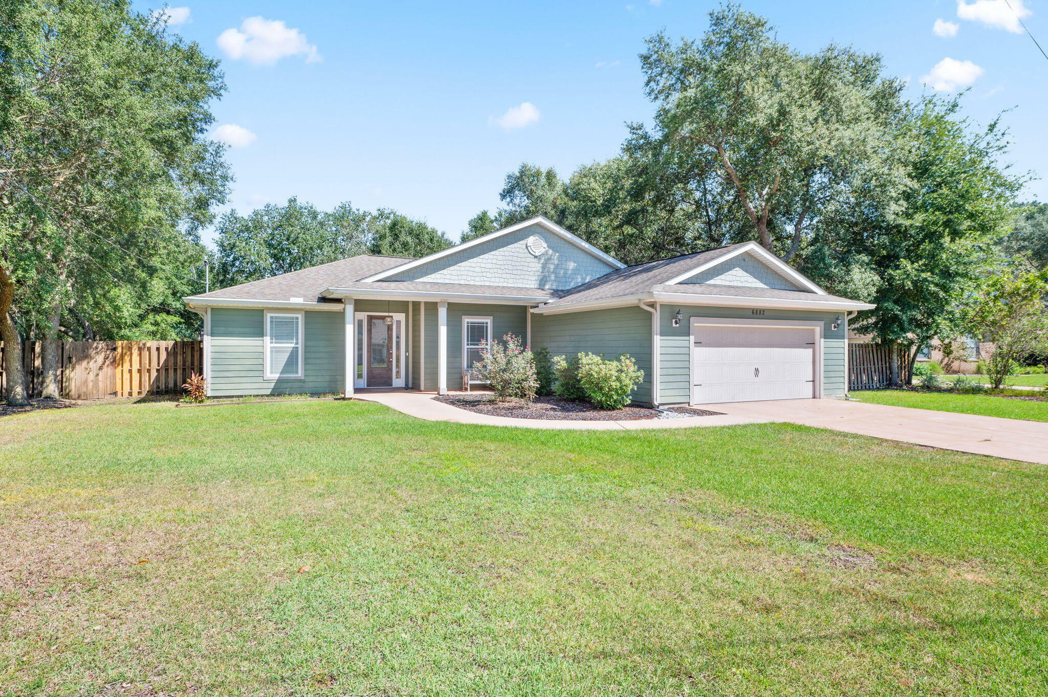 Property Photo:  6882 Brocado Court  FL 32566 