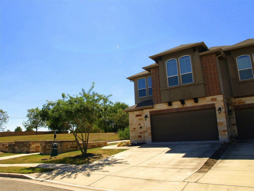 Property Photo:  213 Parable Cove  TX 78660 