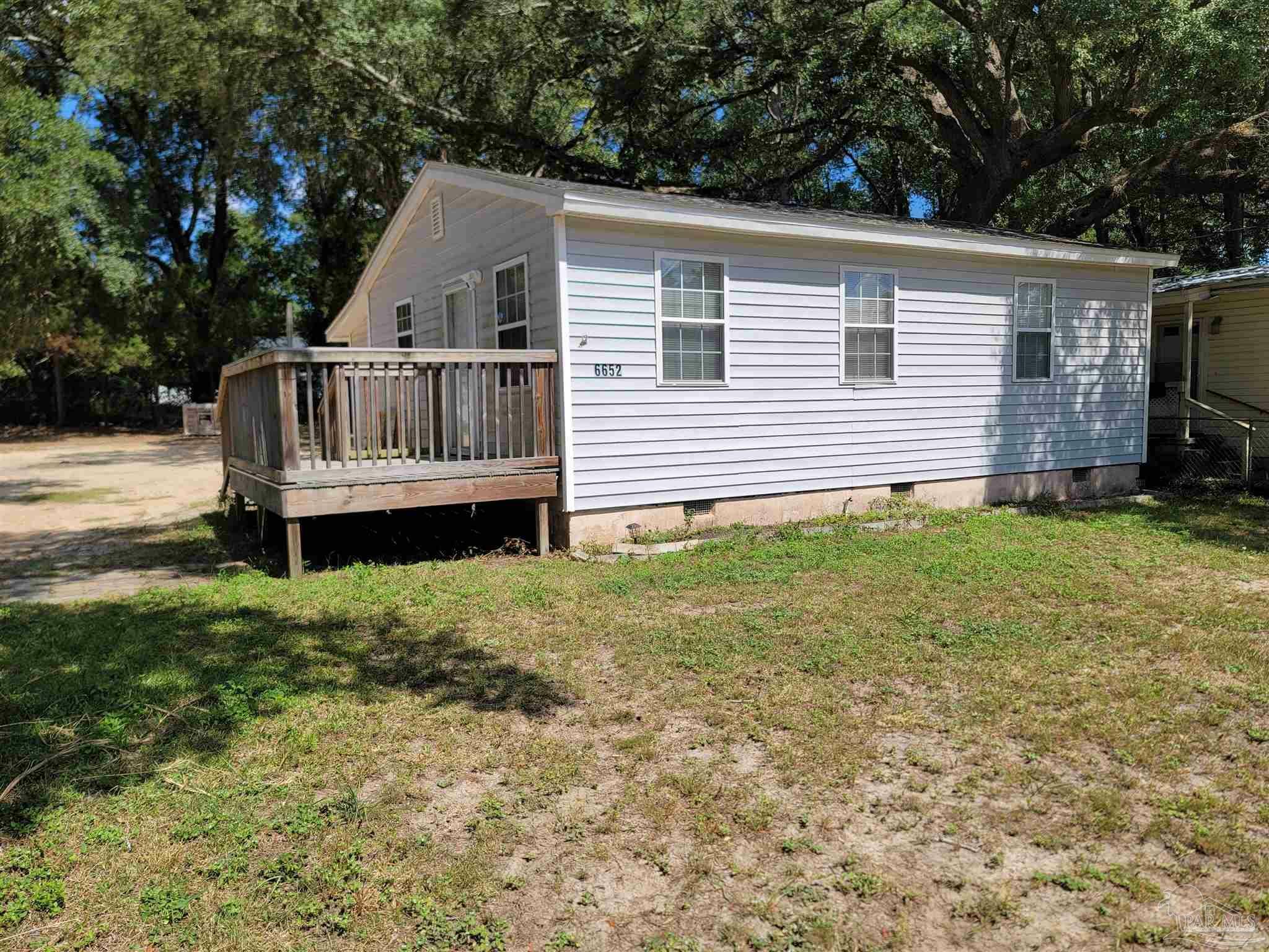 Property Photo:  6652 Cedar St  FL 32570 