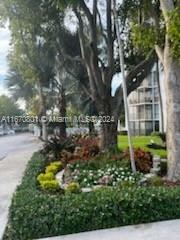 Property Photo:  20400 W Country Club Dr 209  FL 33180 