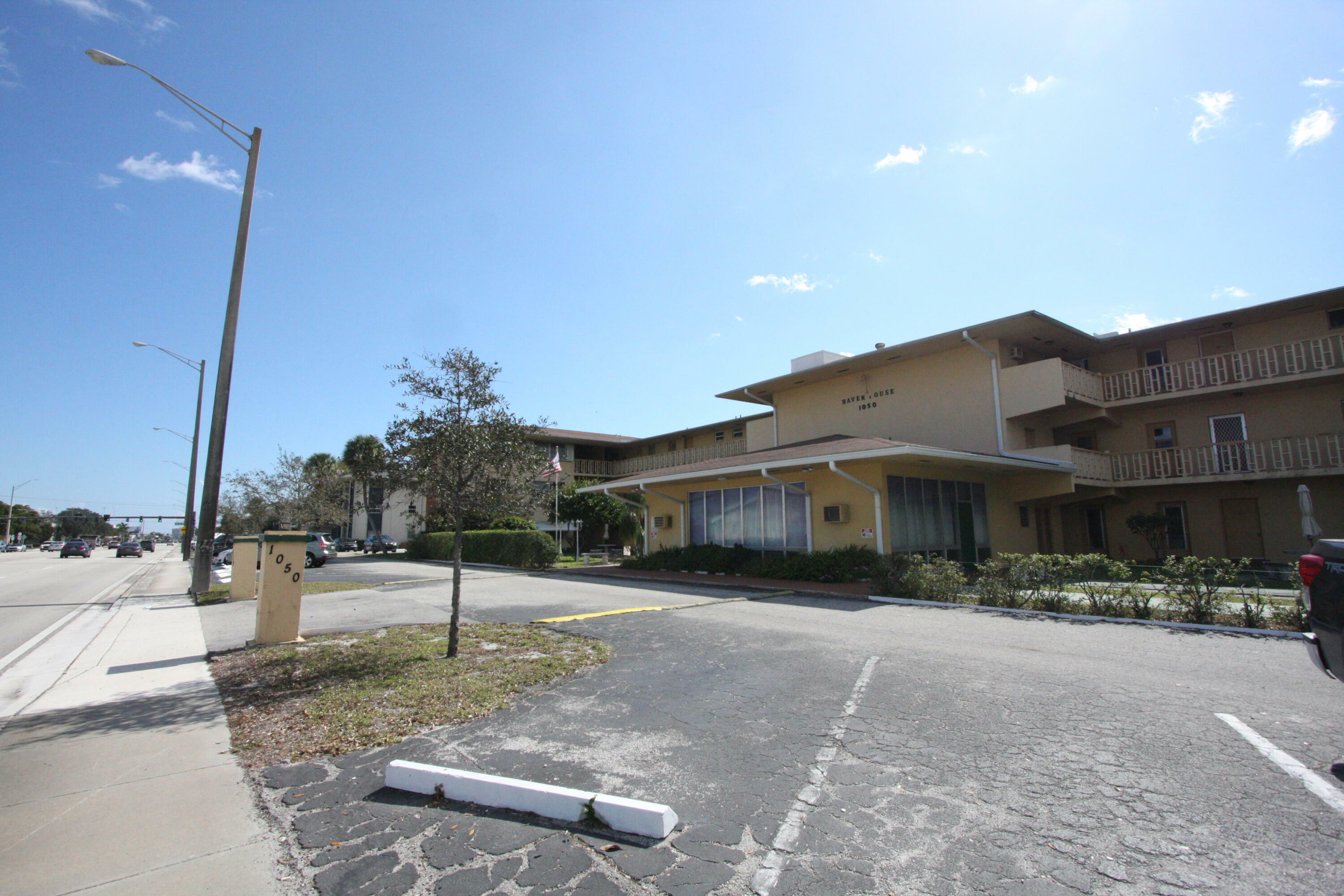 Property Photo:  1050 E Sample Road 209  FL 33064 