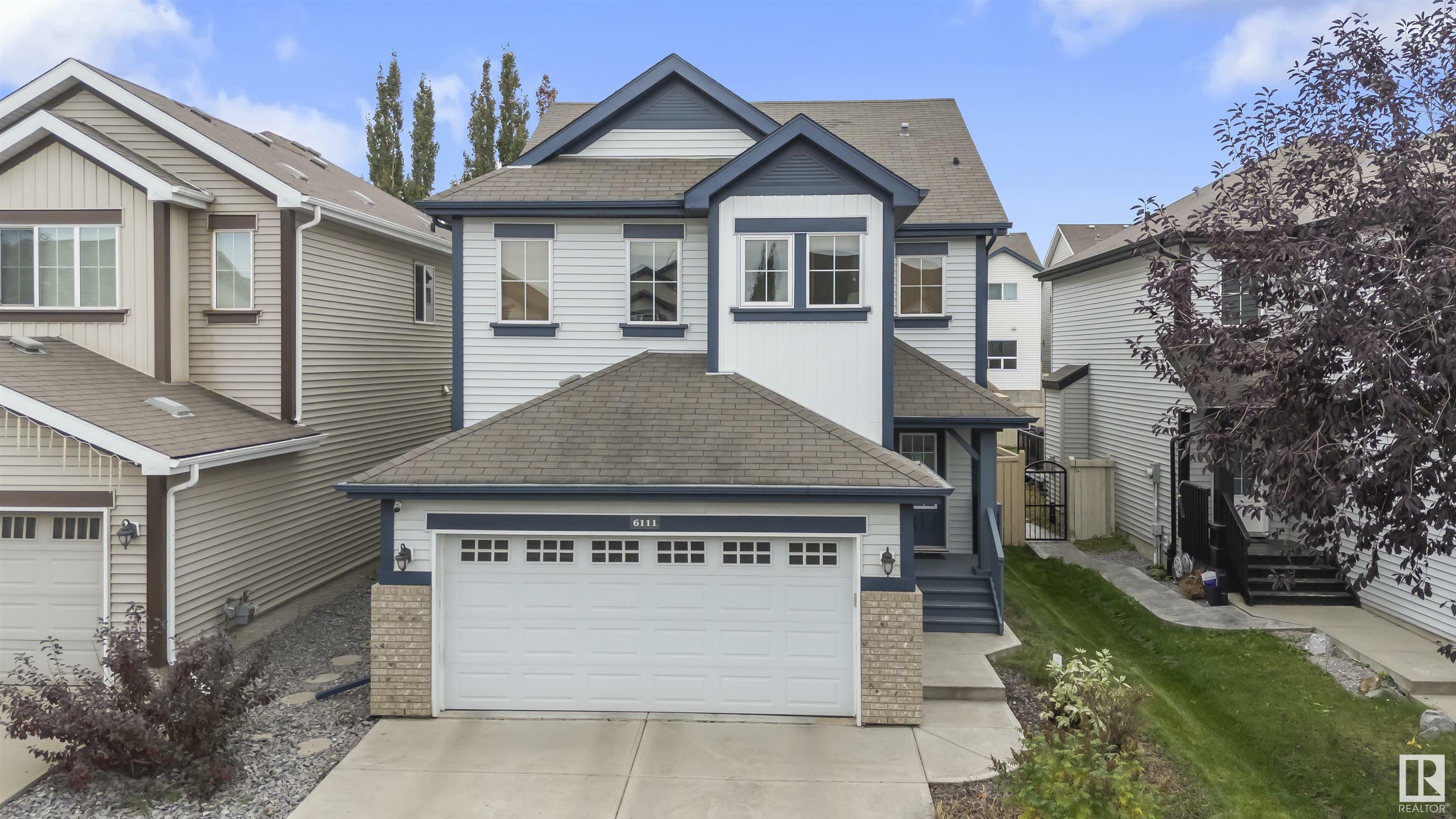 Property Photo:  6111 10 Avenue SW  AB T6X 0M3 