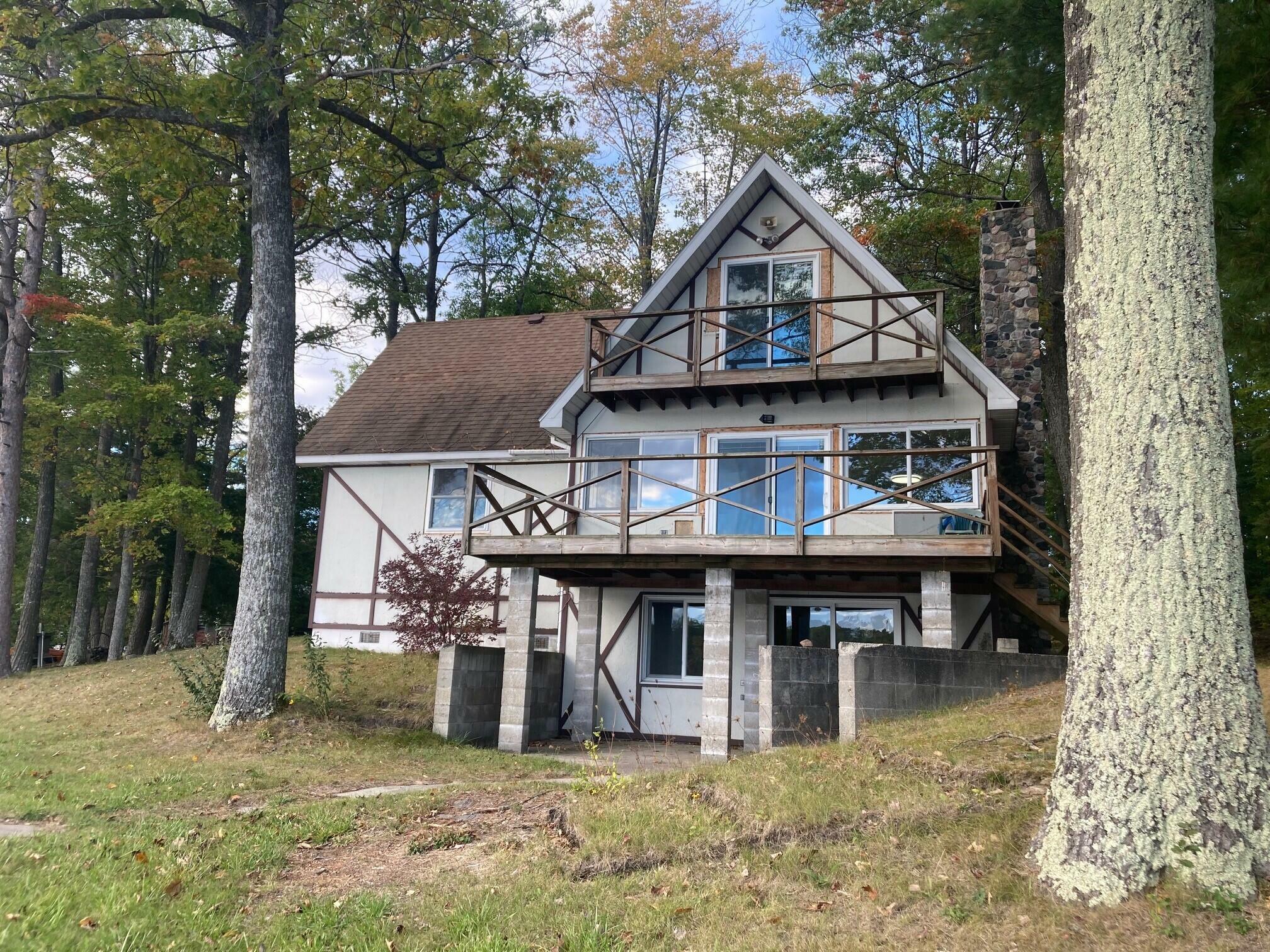 Property Photo:  8228 Lost Lake Rd Road  MI 49743 