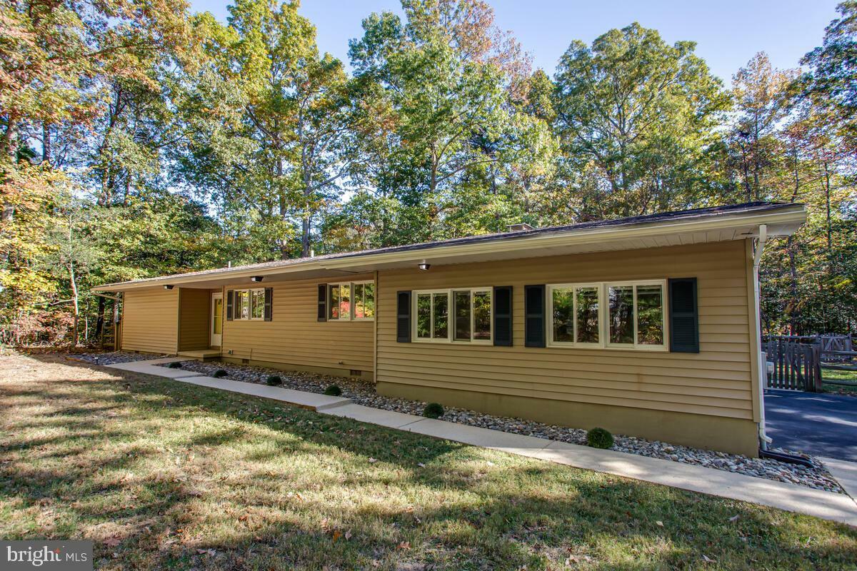 Property Photo:  22966 Split Oak Place  MD 20619 