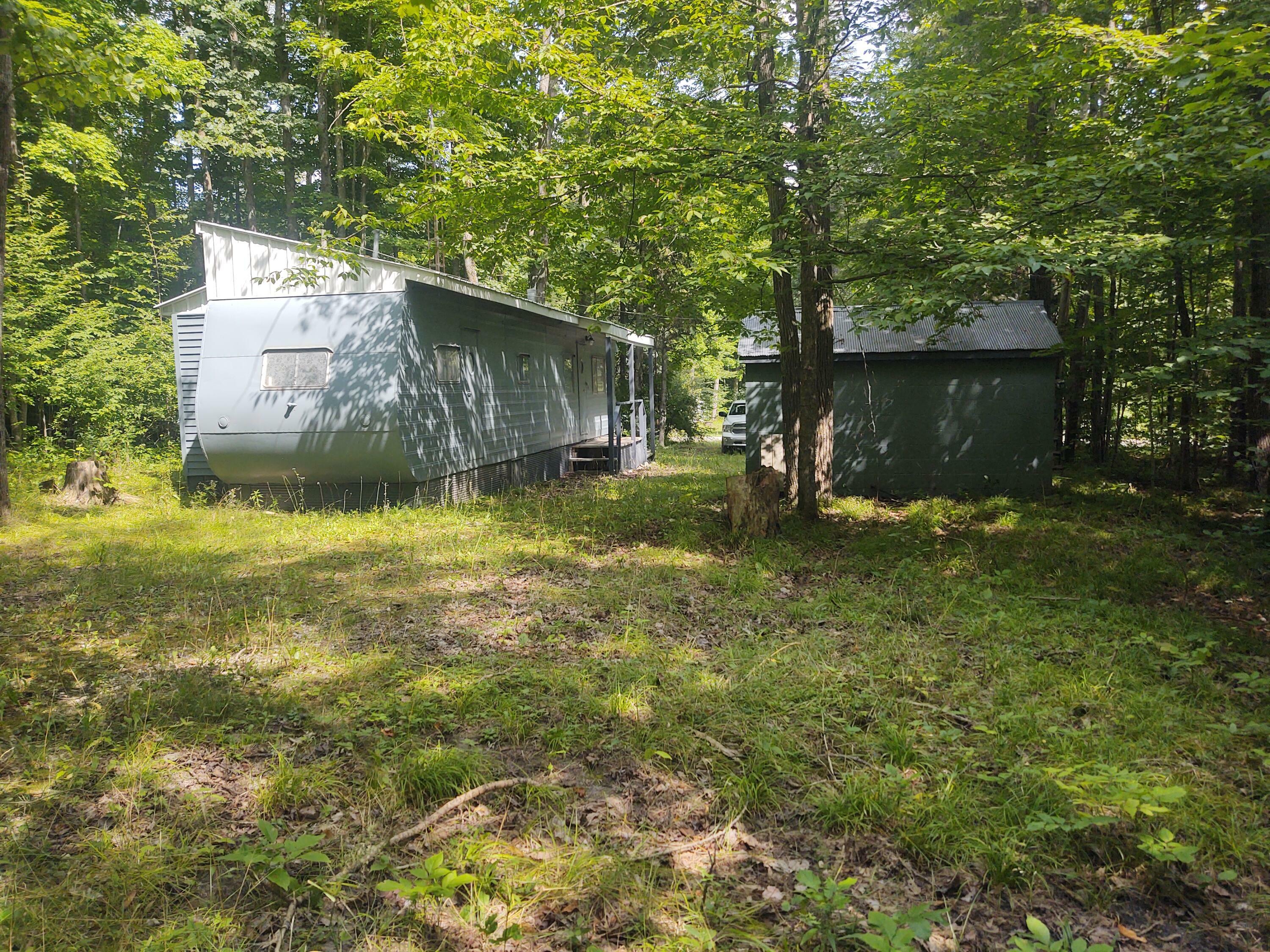 Property Photo:  5206 Fishing Site Road  MI 49746 