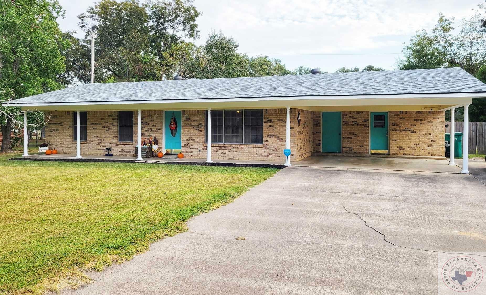 Property Photo:  100 E Walters Blvd  TX 75570 