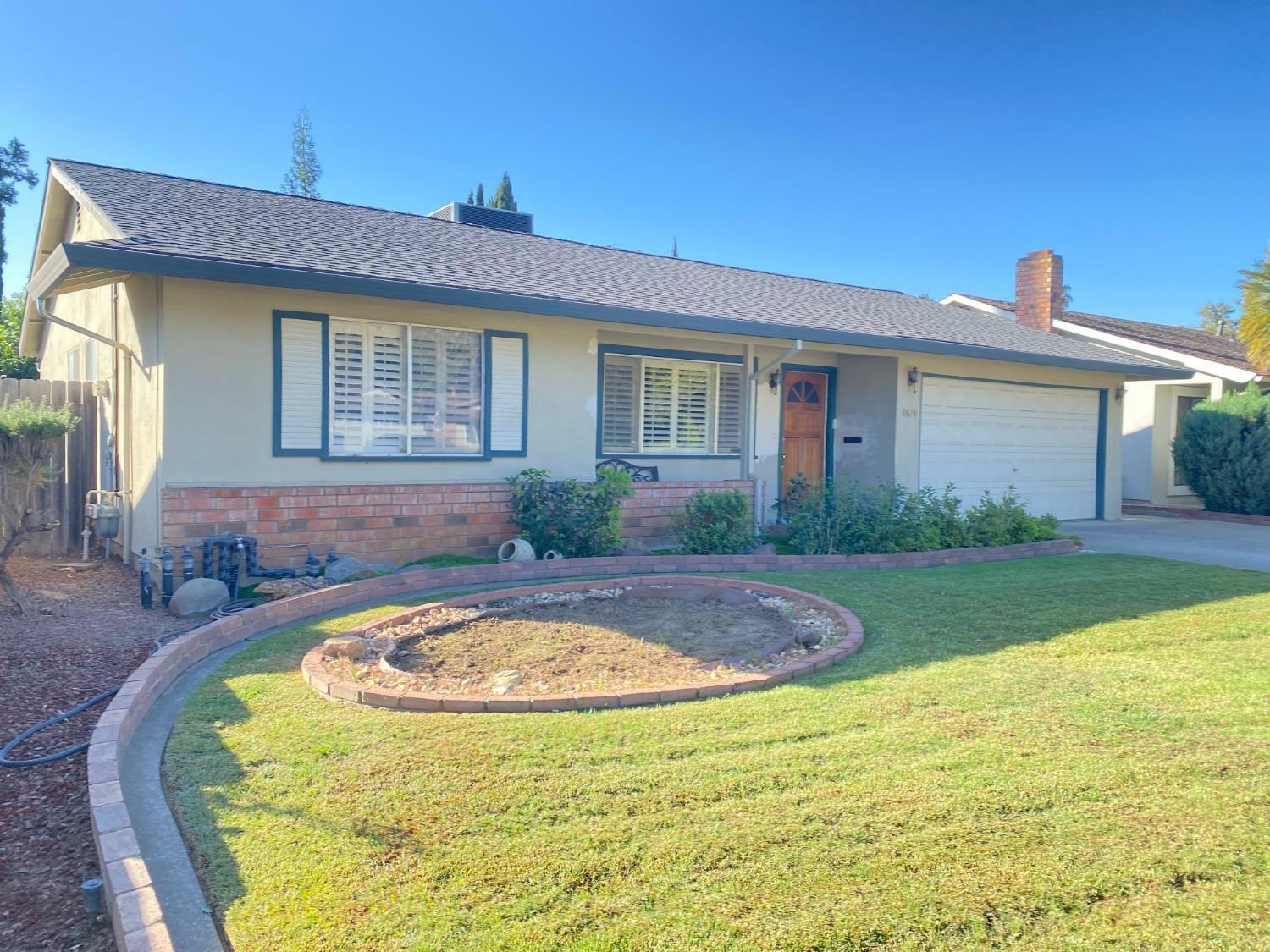 Property Photo:  8878 Woodman Way  CA 95826 