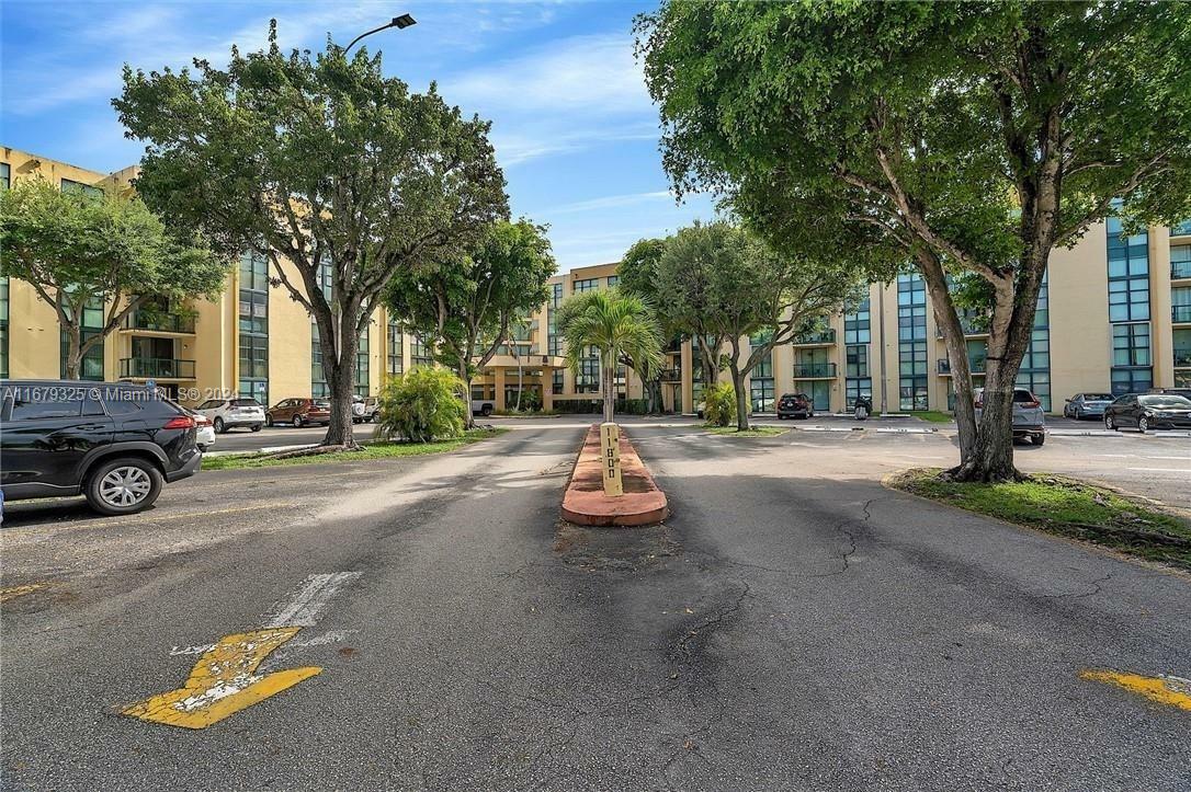 Property Photo:  11800 SW 18th St 408-4  FL 33175 