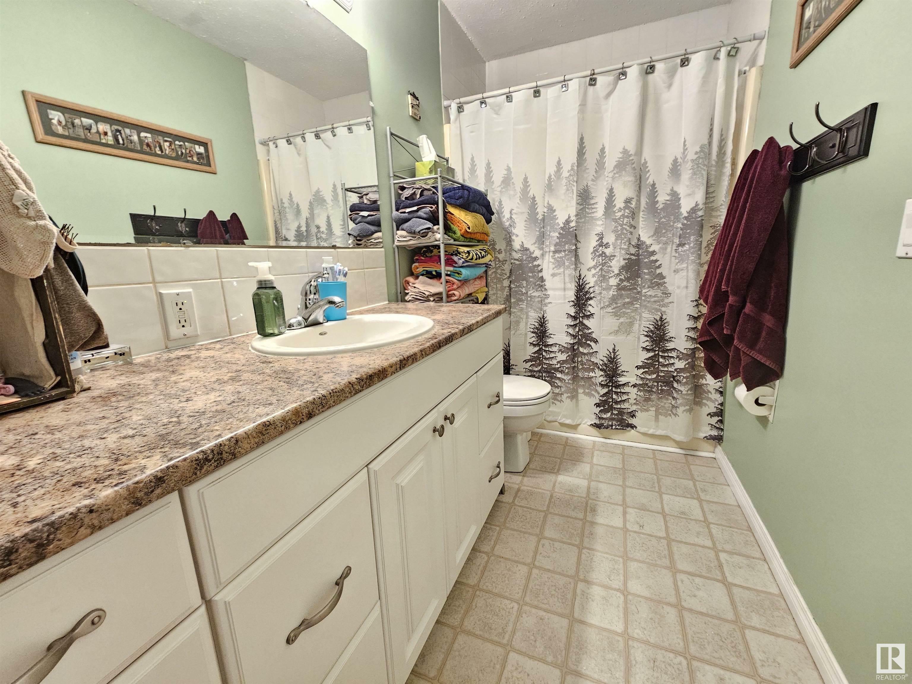 Property Photo:  5707 50 Street  AB T7Z 1A8 