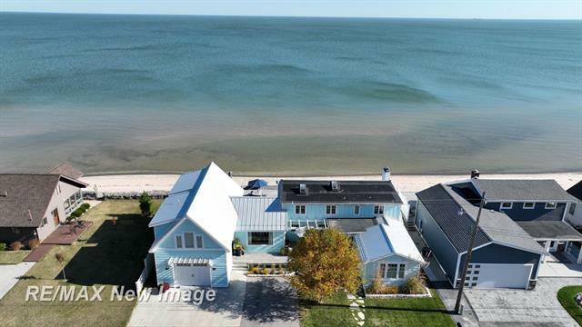 Property Photo:  401 Ricoma Beach Road  MI 48706 