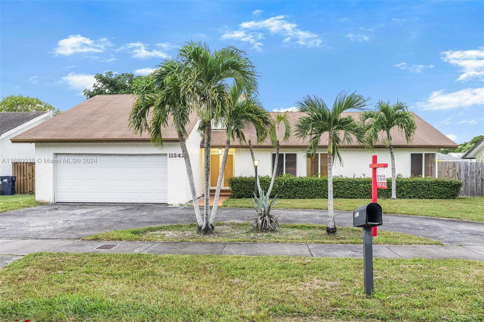 Property Photo:  11242 SW 129th Ct  FL 33186 