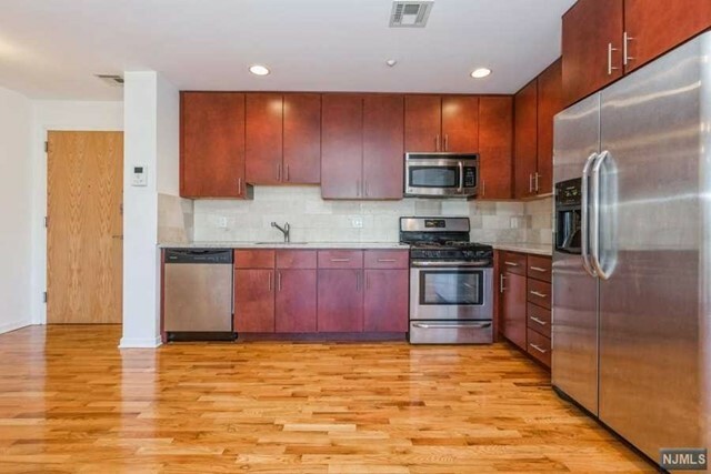 Property Photo:  17 Meadow Road 204  NJ 07070 