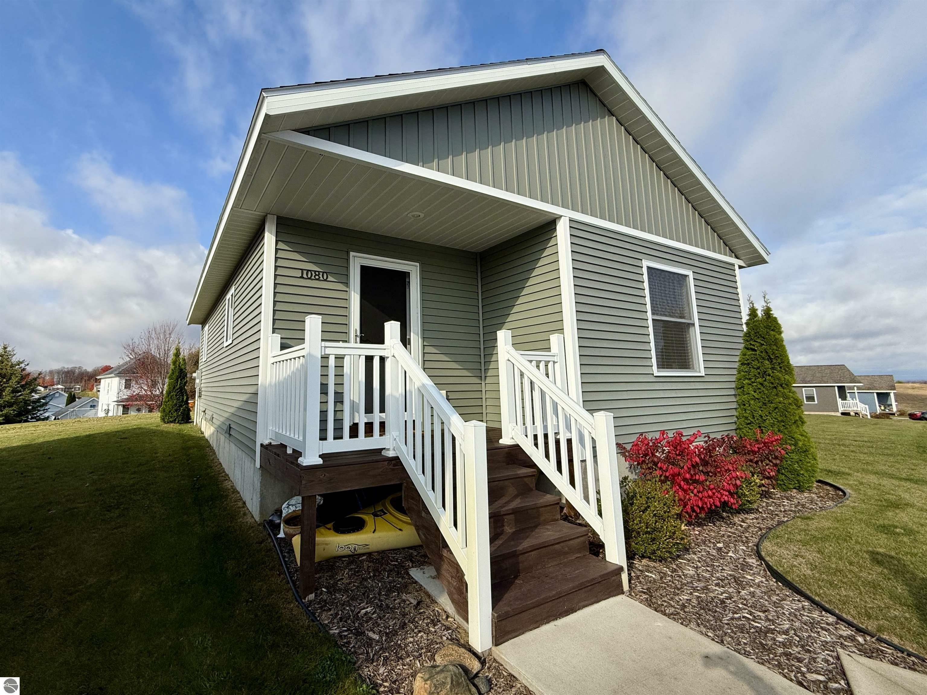 Property Photo:  1080 Cupola Place  MI 49686 