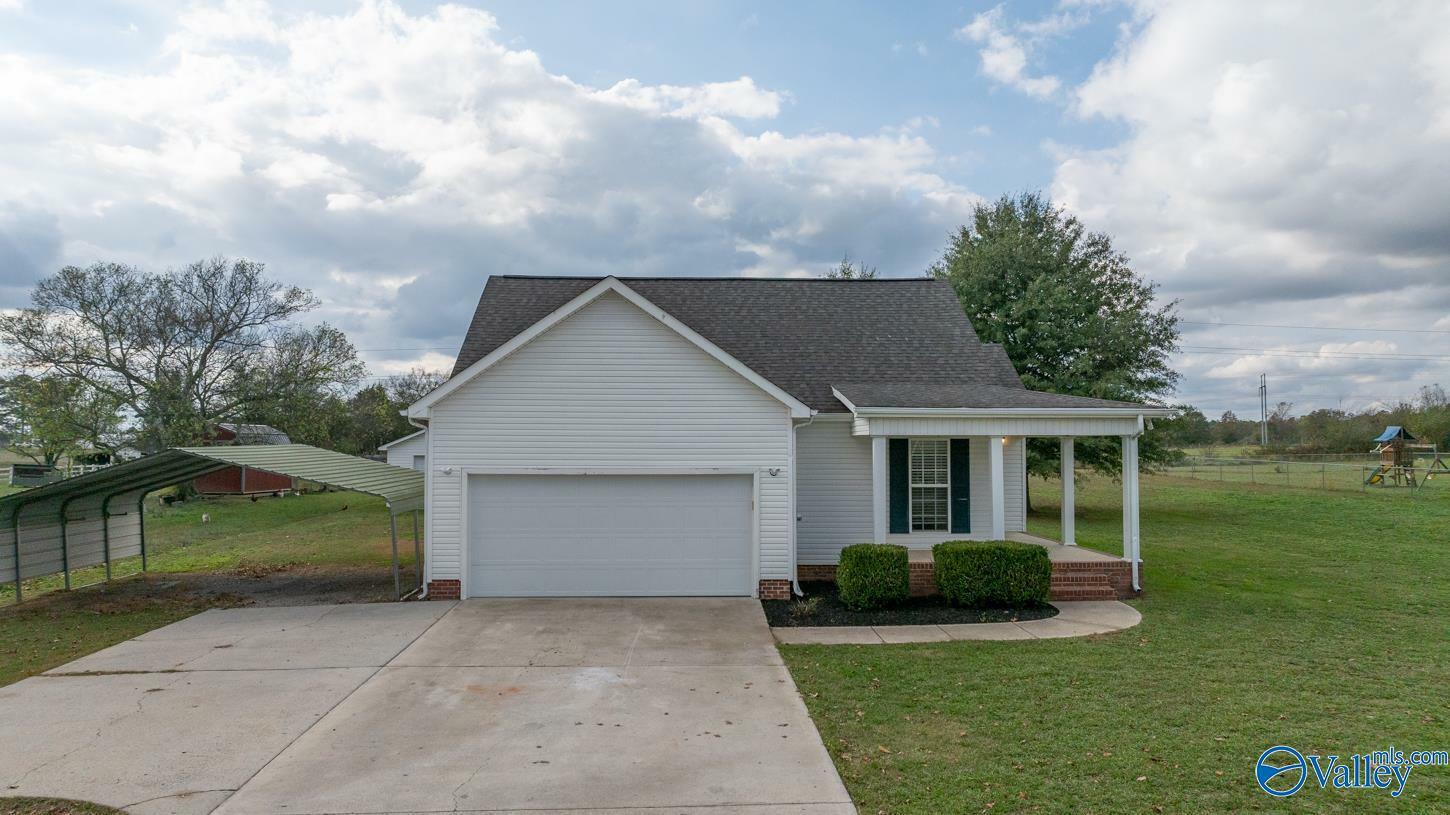 Property Photo:  25135 Mooresville Road  AL 35620 