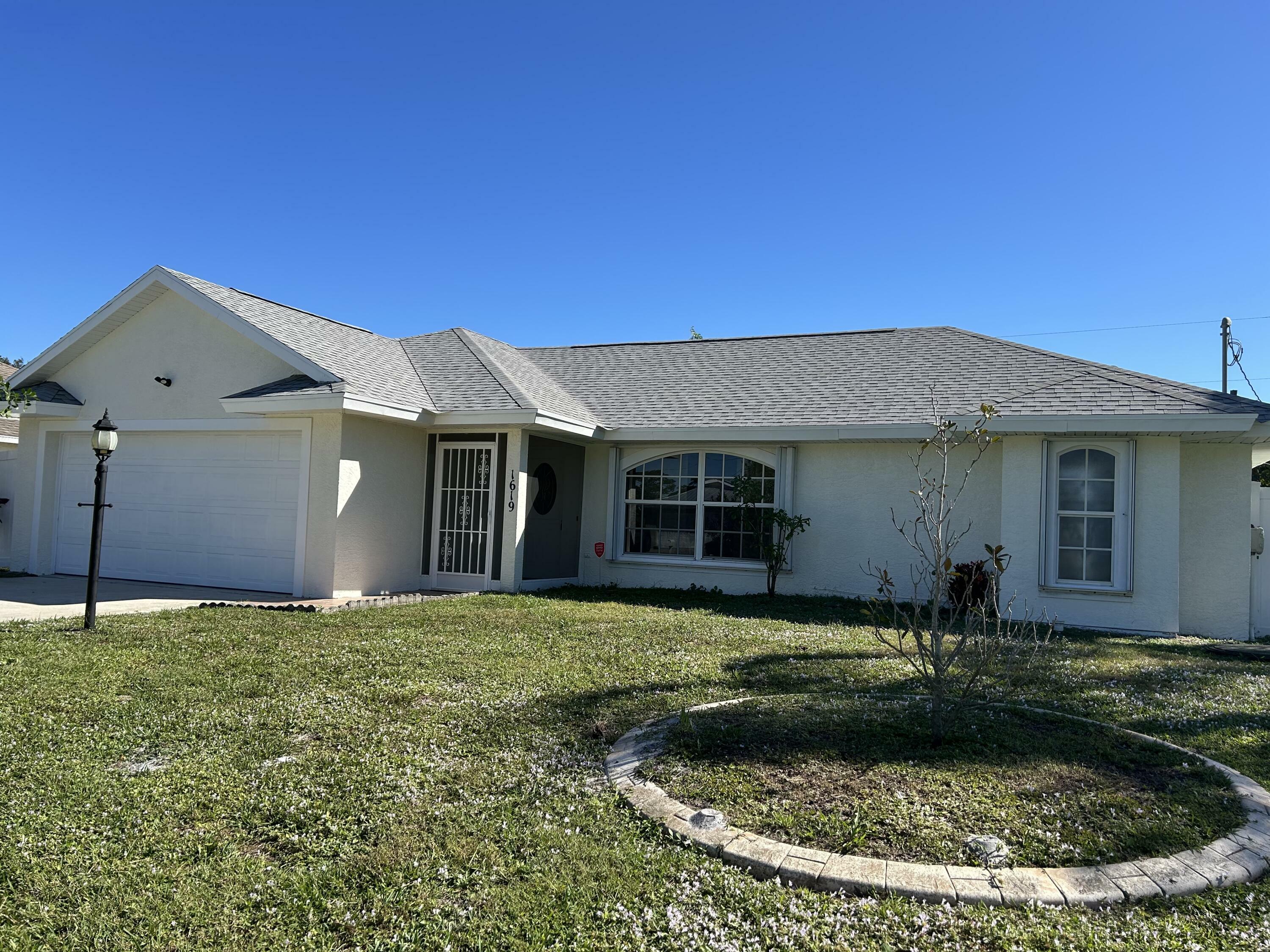 Property Photo:  1619 SE Haverford Street  FL 34983 