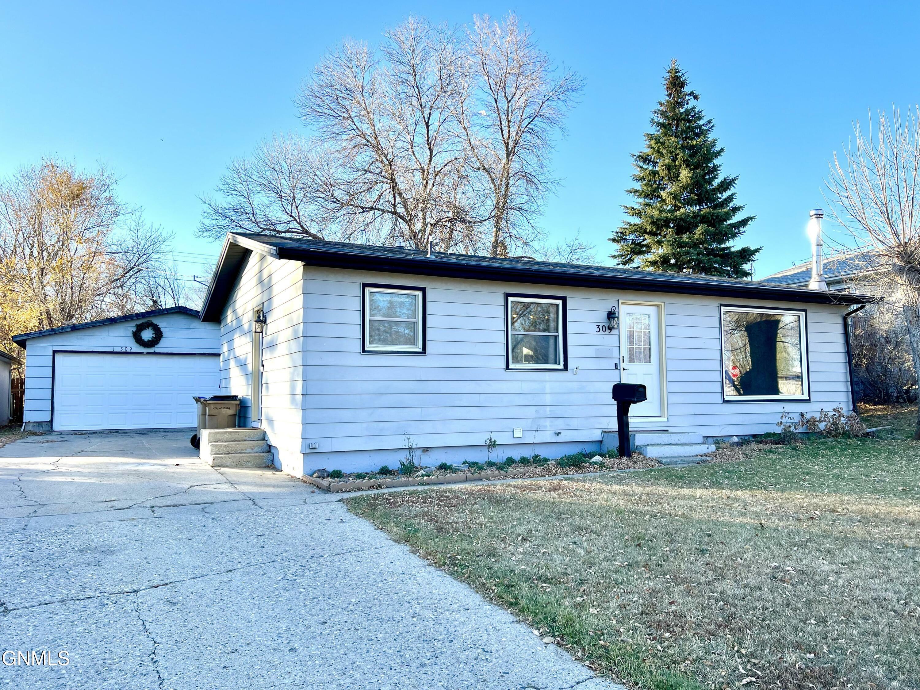 Property Photo:  309 24th Street NW  ND 58703 