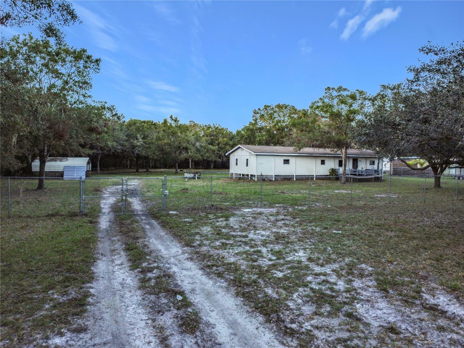 Property Photo:  5585 Lake Lizzie Drive  FL 34771 