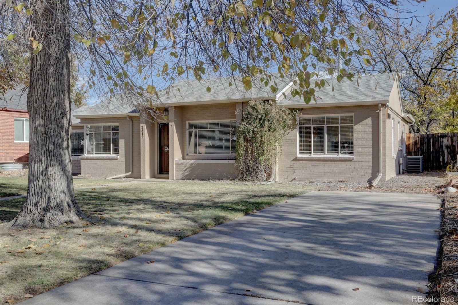 Property Photo:  2812 Krameria Street  CO 80207 