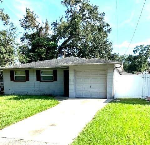 Property Photo:  2702 W Henry Avenue  FL 33614 