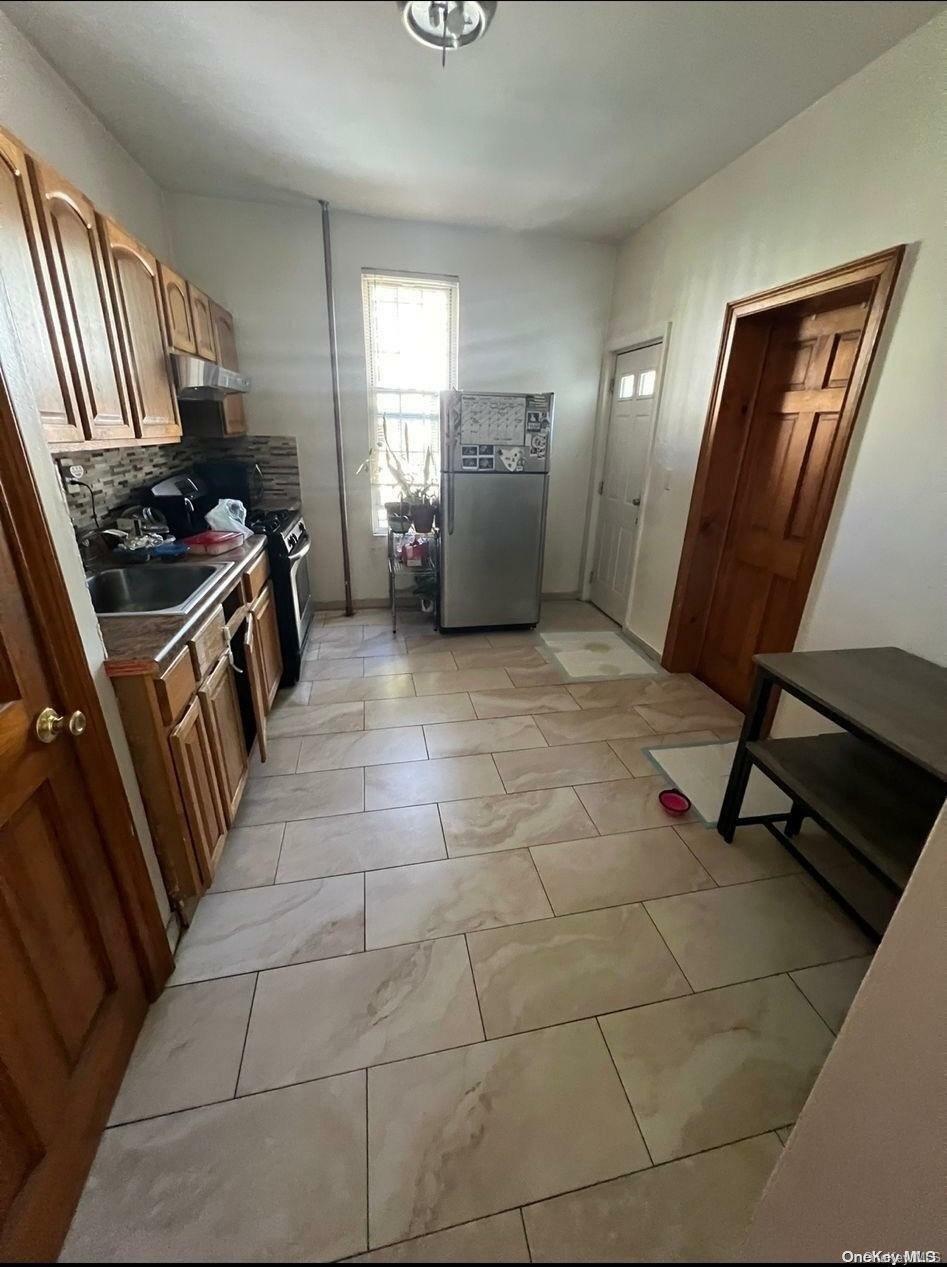 Property Photo:  303 Milford Street  NY 11208 