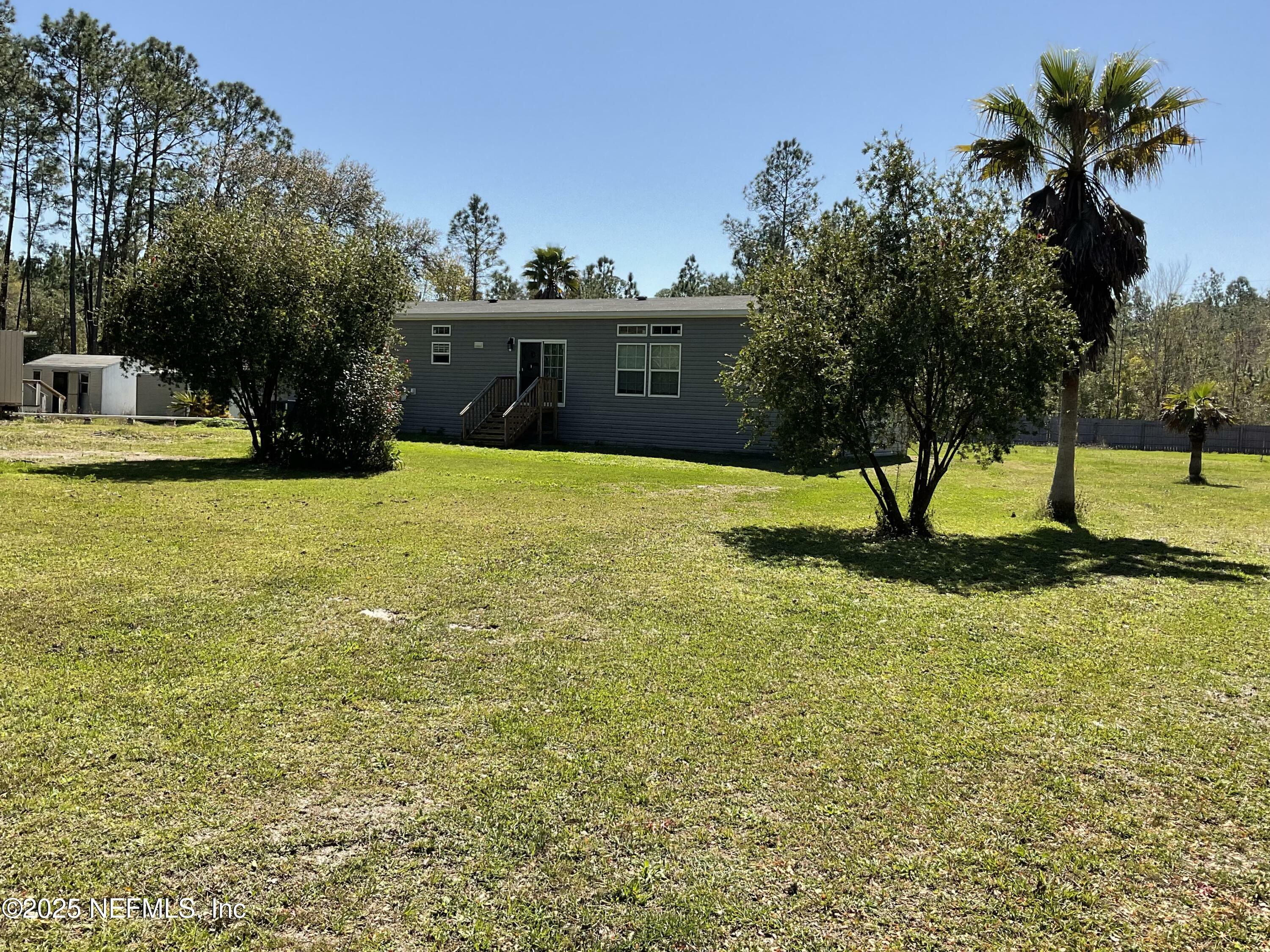 Property Photo:  100 Camp Road  FL 32177 