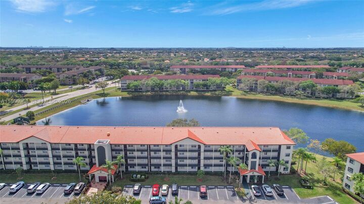 Property Photo:  12900 SW 13th St 214E  FL 33027 