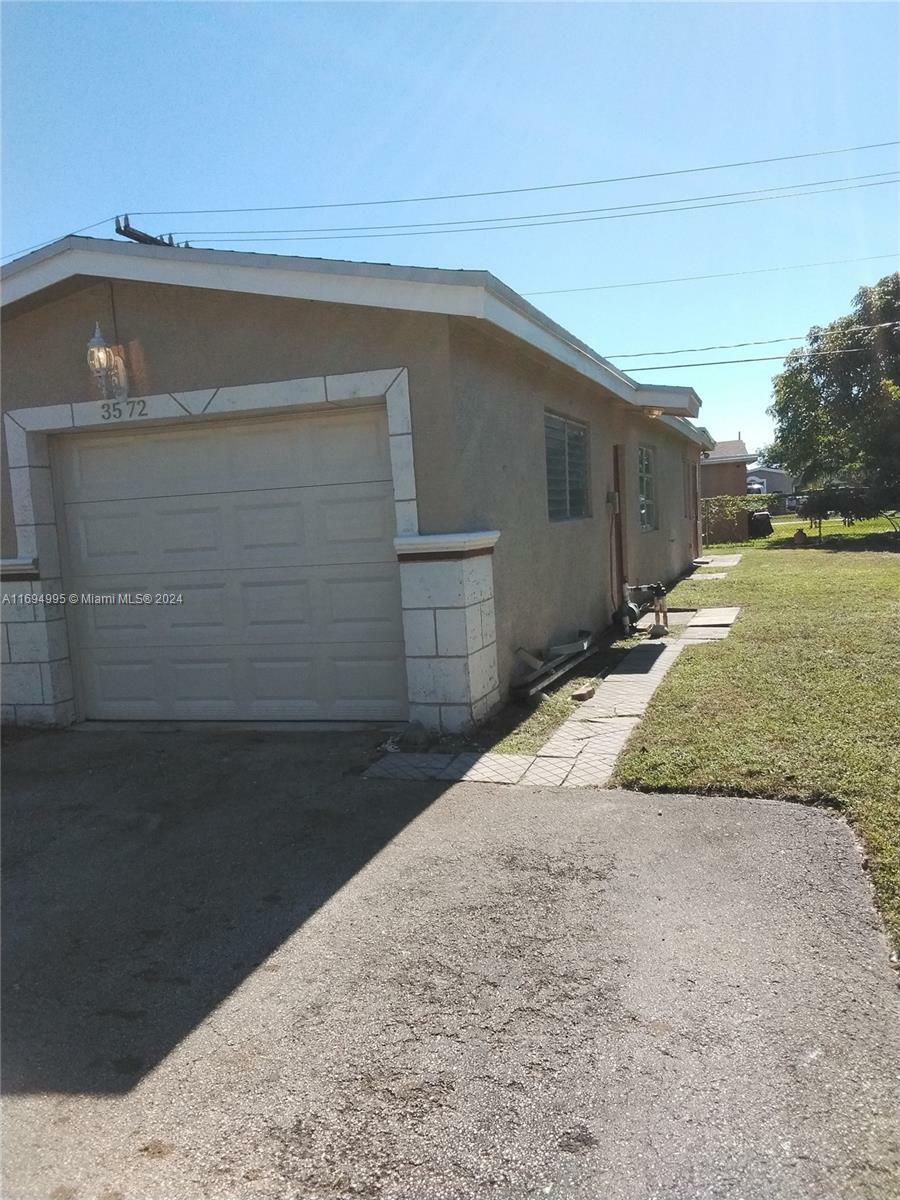 Property Photo:  3572 NW 35th St  FL 33309 