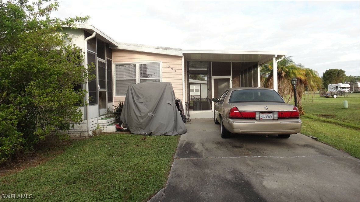 Property Photo:  541 Freedom Street  FL 33917 