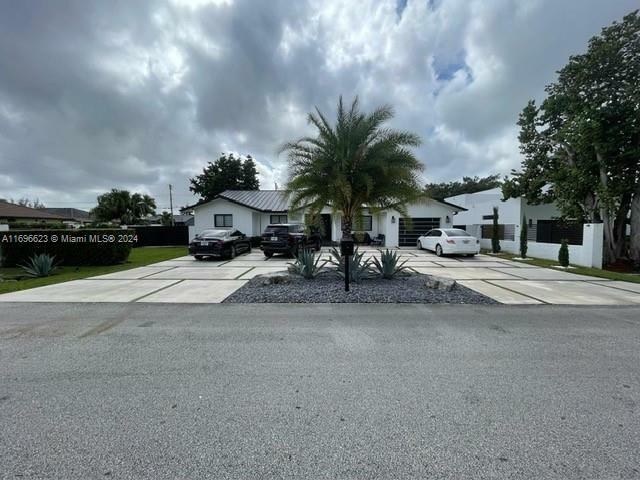 Property Photo:  9800 NW 28th Ter  FL 33172 