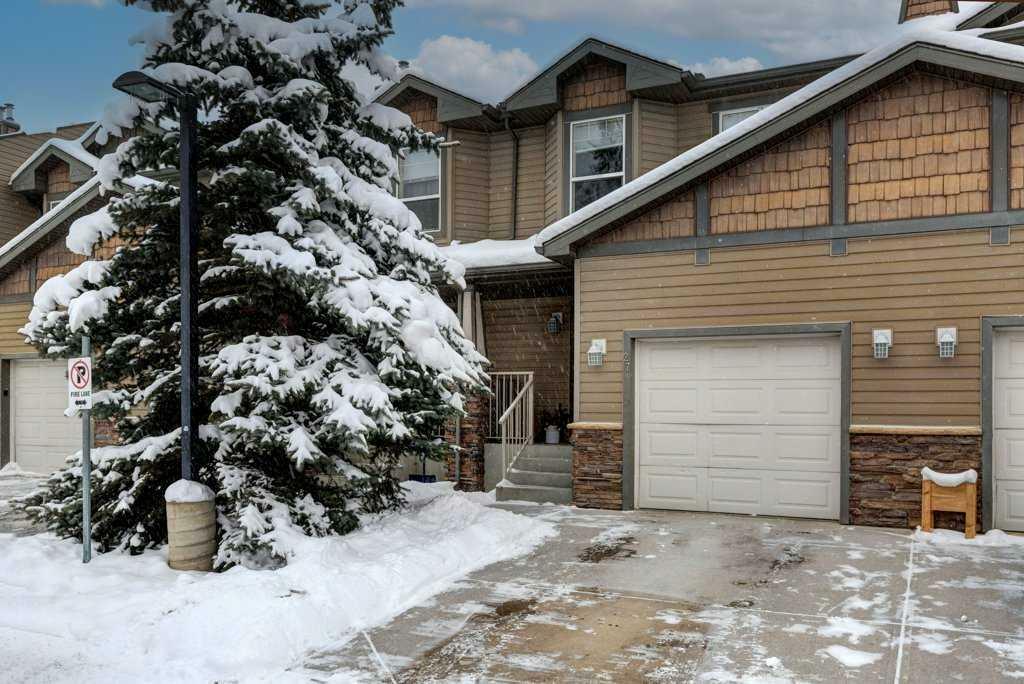 Property Photo:  27 Spring Meadows Bay  AB T1S 2G8 