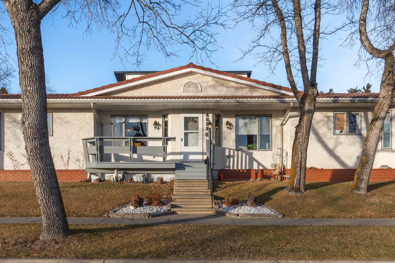 Property Photo:  4821 54 Street B  AB T4V 2A3 