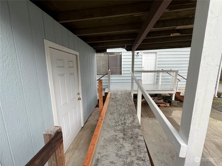 Property Photo: 9111 66th Ave NW 105 WA 98332