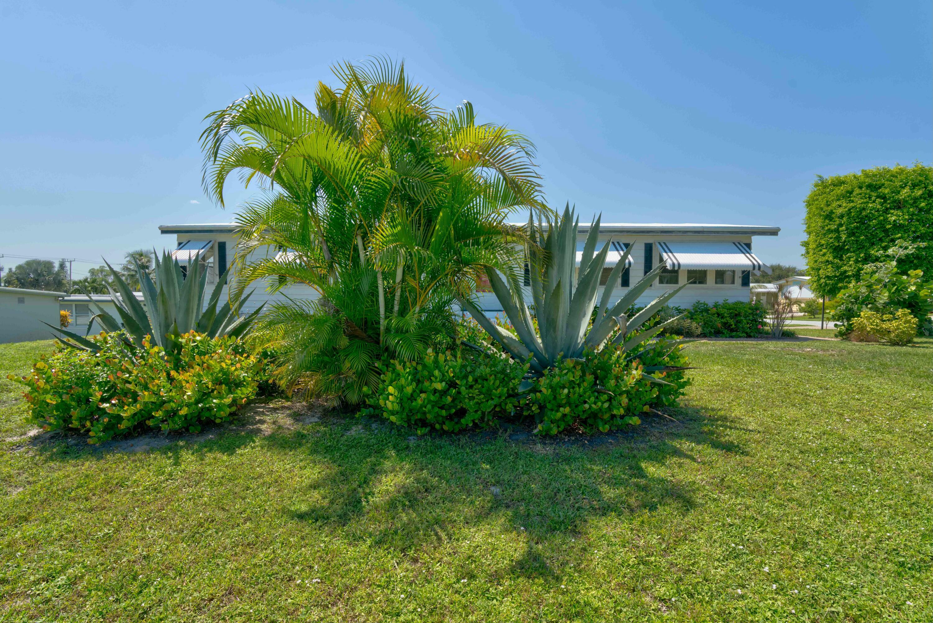 Property Photo:  7075 SE Bluebird Circle  FL 33455 