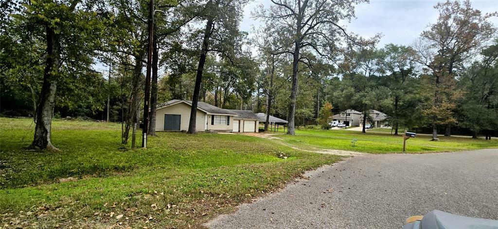Property Photo: 707 Smokey River Bend TX 77316