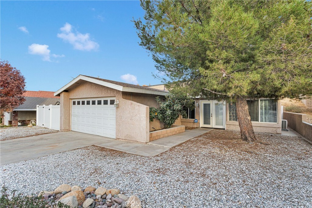 Property Photo:  12899 Spring Valley Parkway  CA 92395 