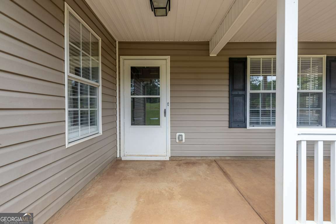 Property Photo:  5613 Highway 81 E  GA 30252 