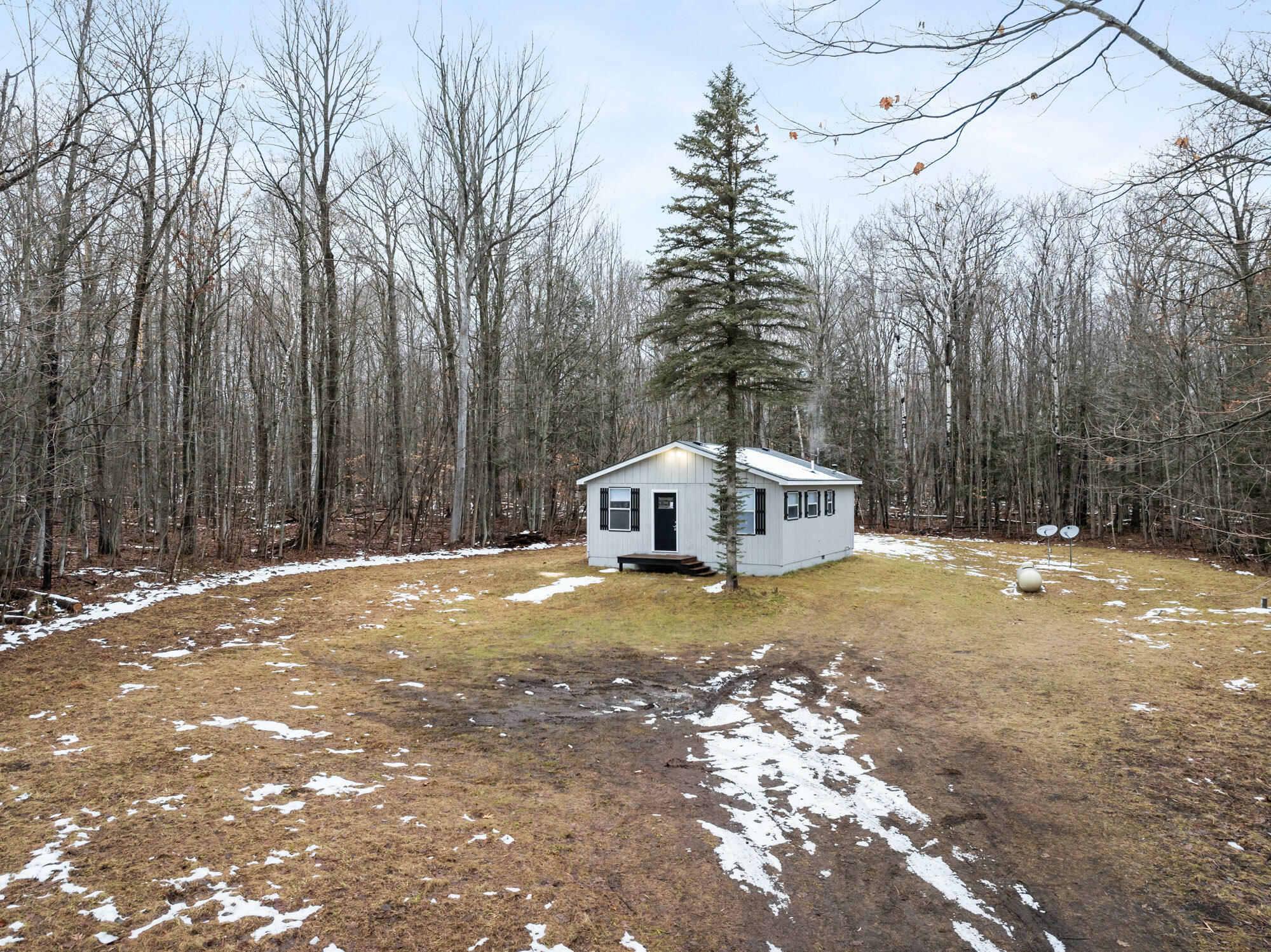 Property Photo:  4280 Woodmansee Road  MI 49721 