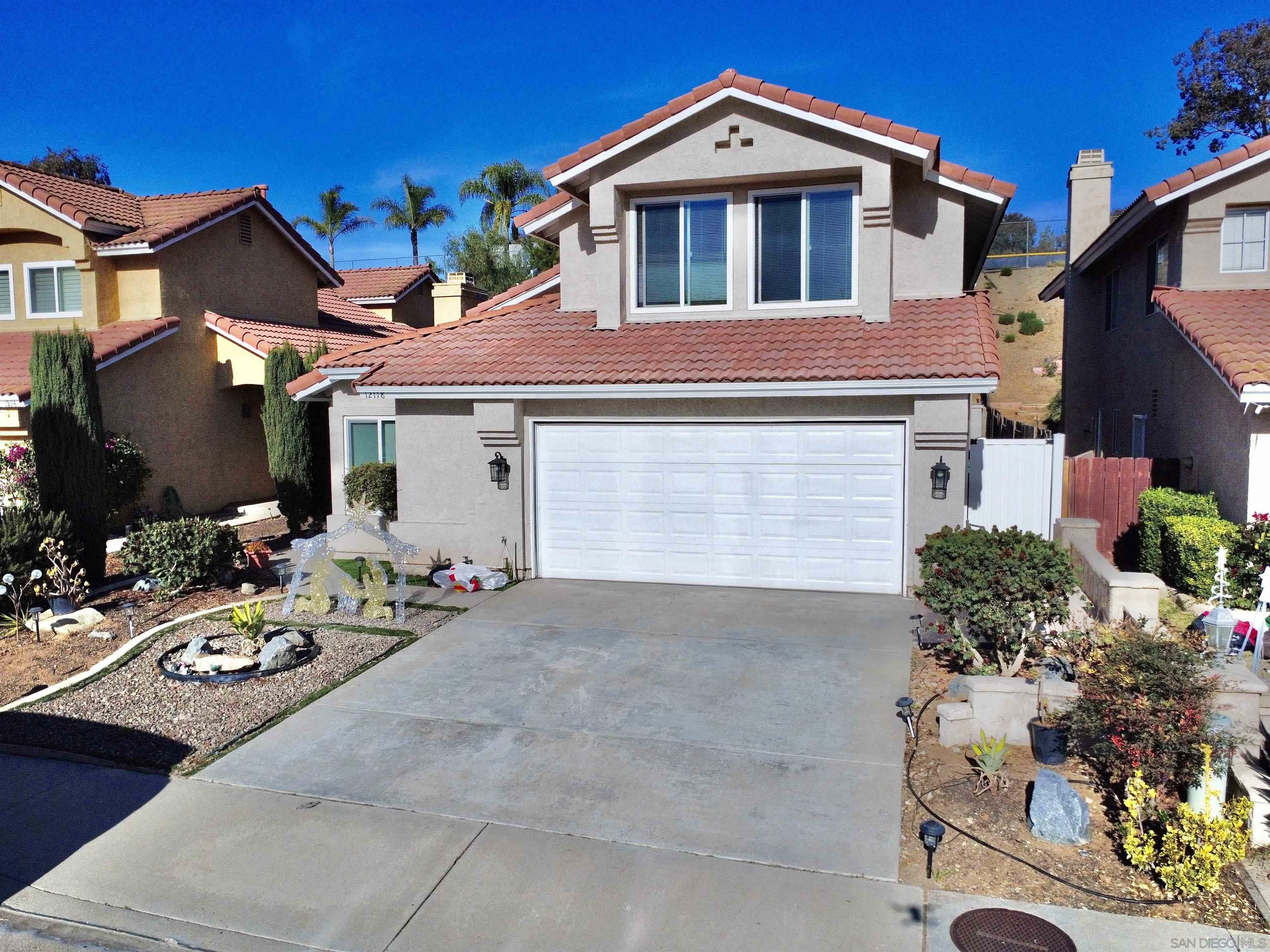 Property Photo:  12118 Via Serrano  CA 92019 