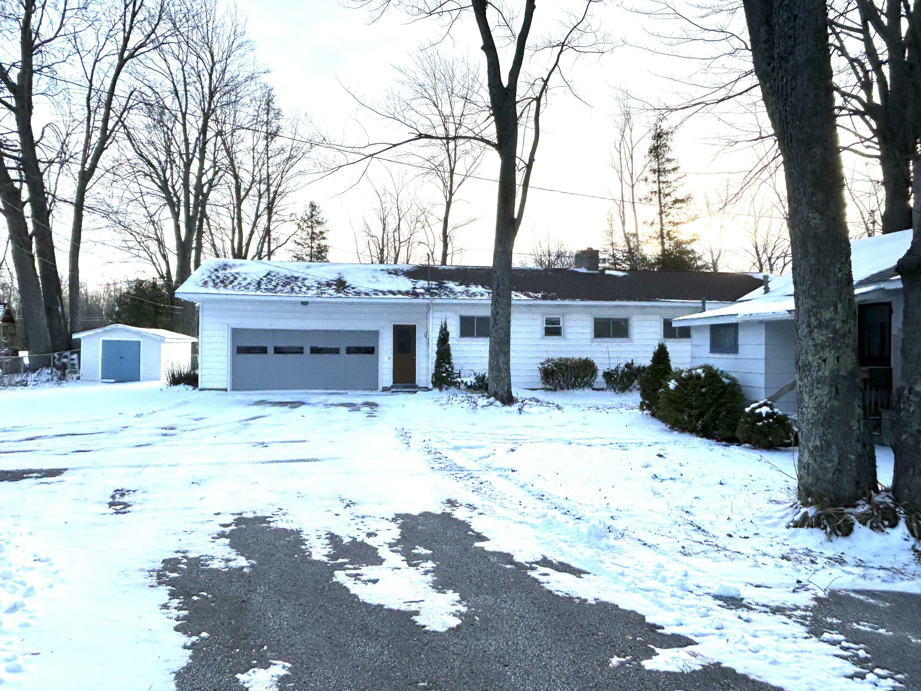 Property Photo:  8978 Gutchess Road  MI 49707 