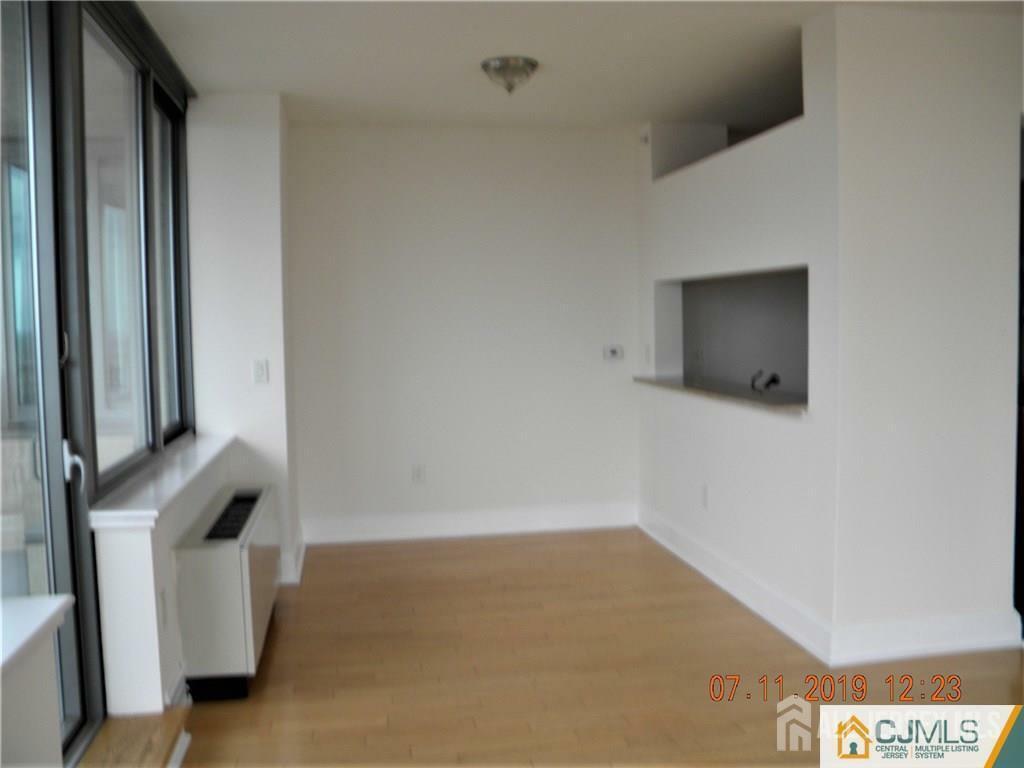 Property Photo:  1 Spring Street 1805  NJ 08901 