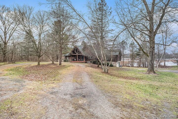 Property Photo: 121 Davis Lake Road MI 48446 1468