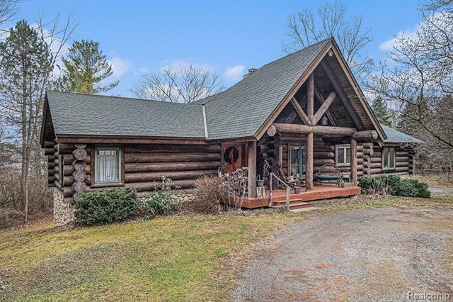 Property Photo:  121 Davis Lake Road  MI 48446 