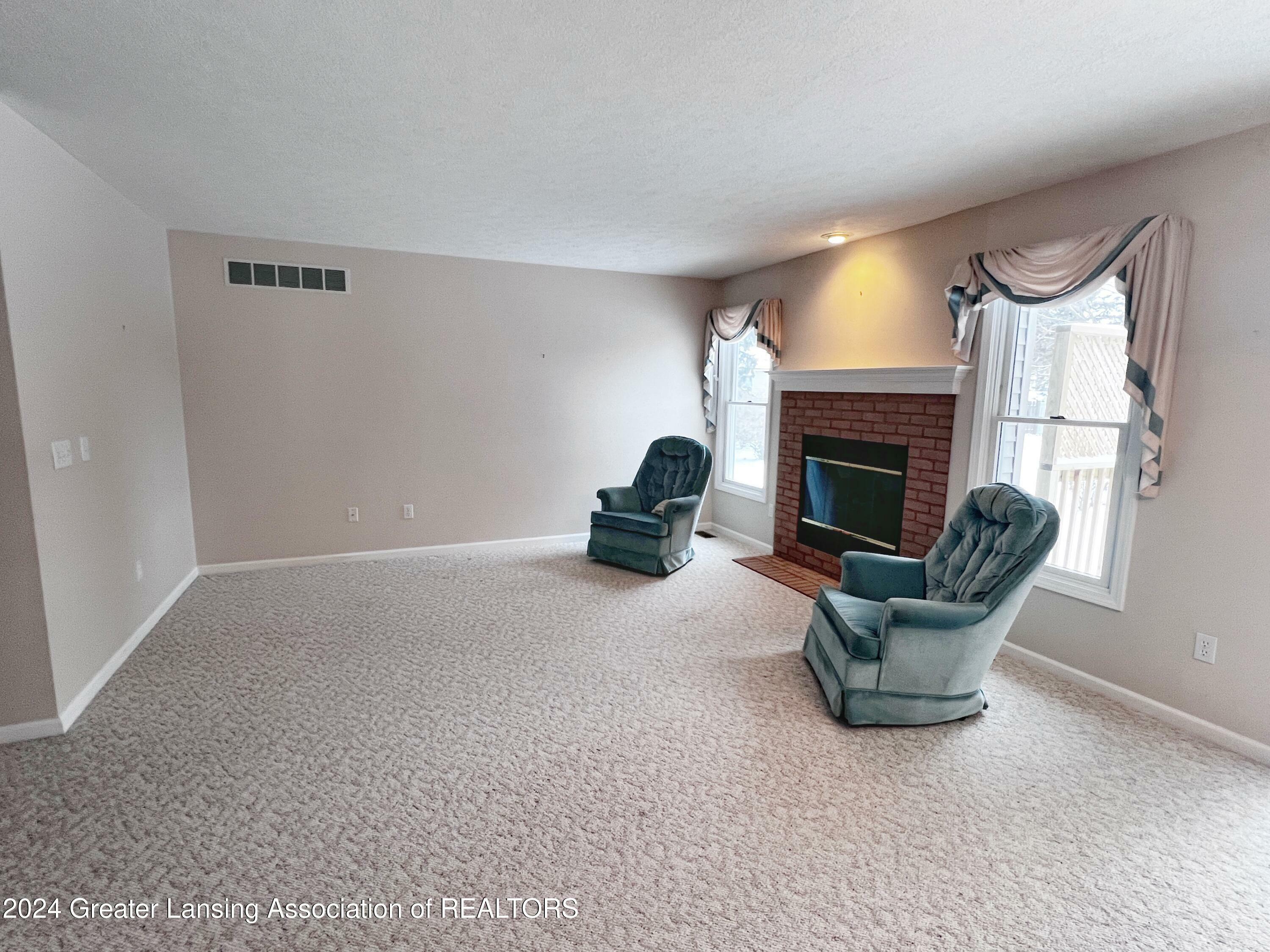 Property Photo:  109 Avon Drive  MI 48854 