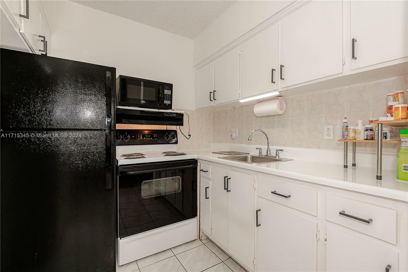 Property Photo:  815 SW 10th Ter 18V  FL 33009 