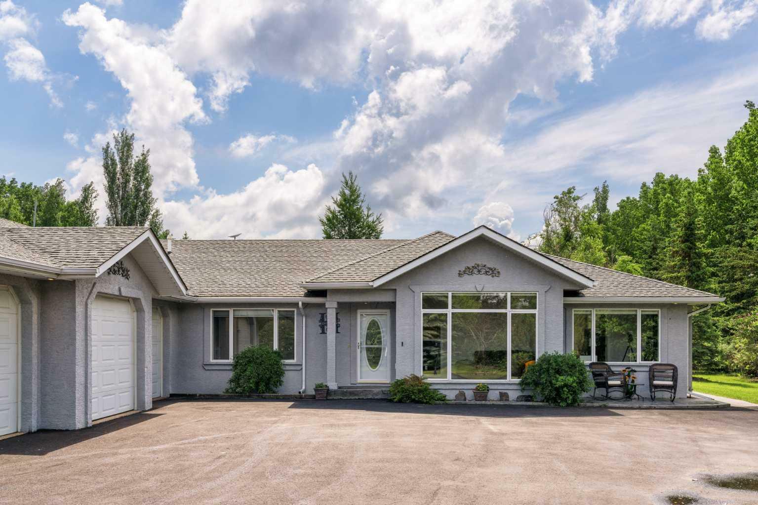 Property Photo:  4 Silvertip Drive  AB T1V 1Z1 