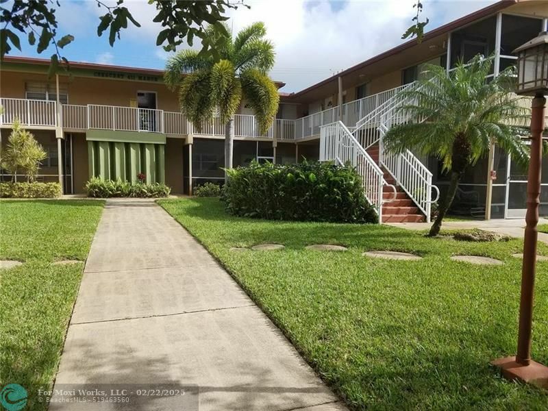 Property Photo:  411 S Crescent Dr 104  FL 33021 