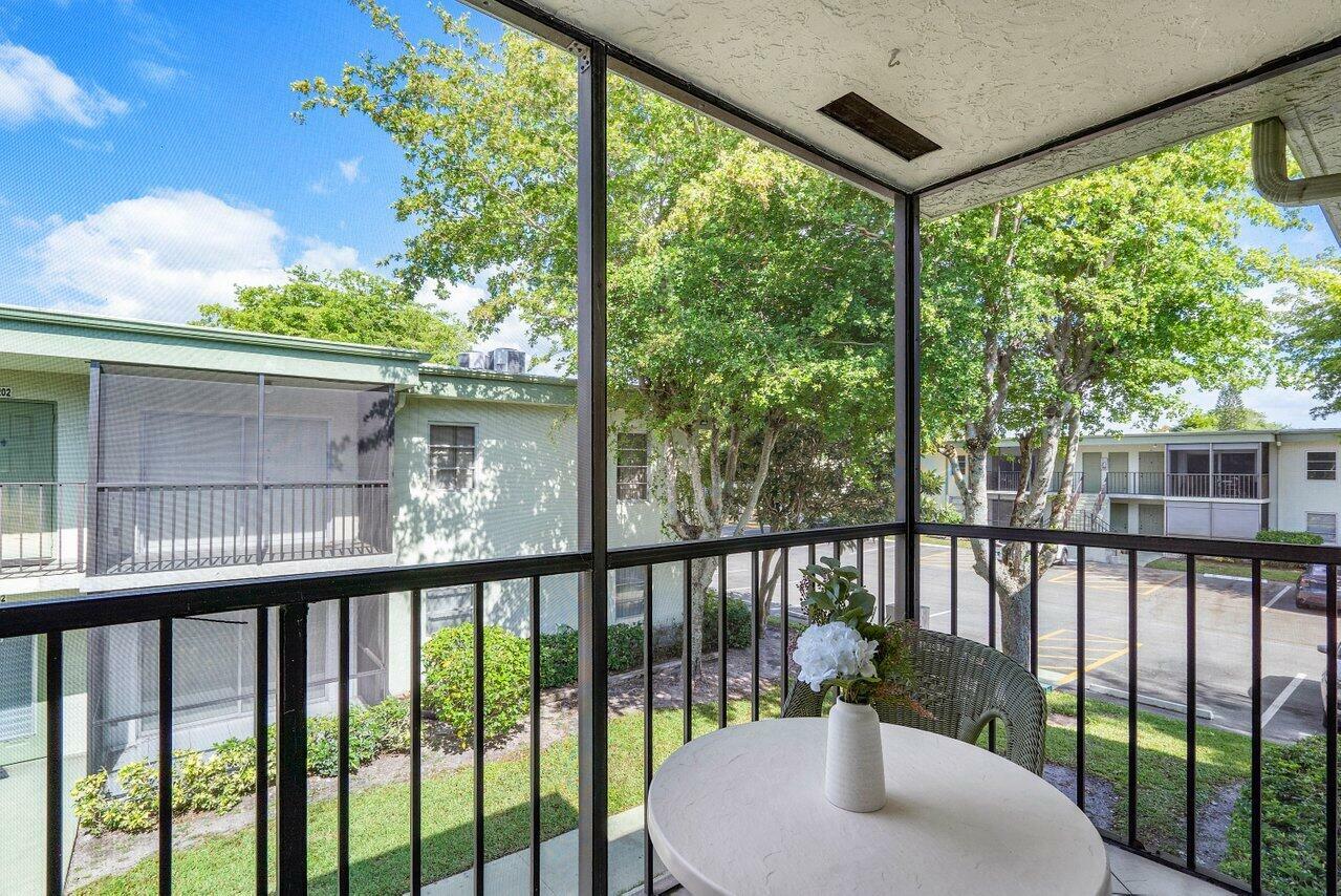 Property Photo: 7511 S Oriole Boulevard 203 FL 33446