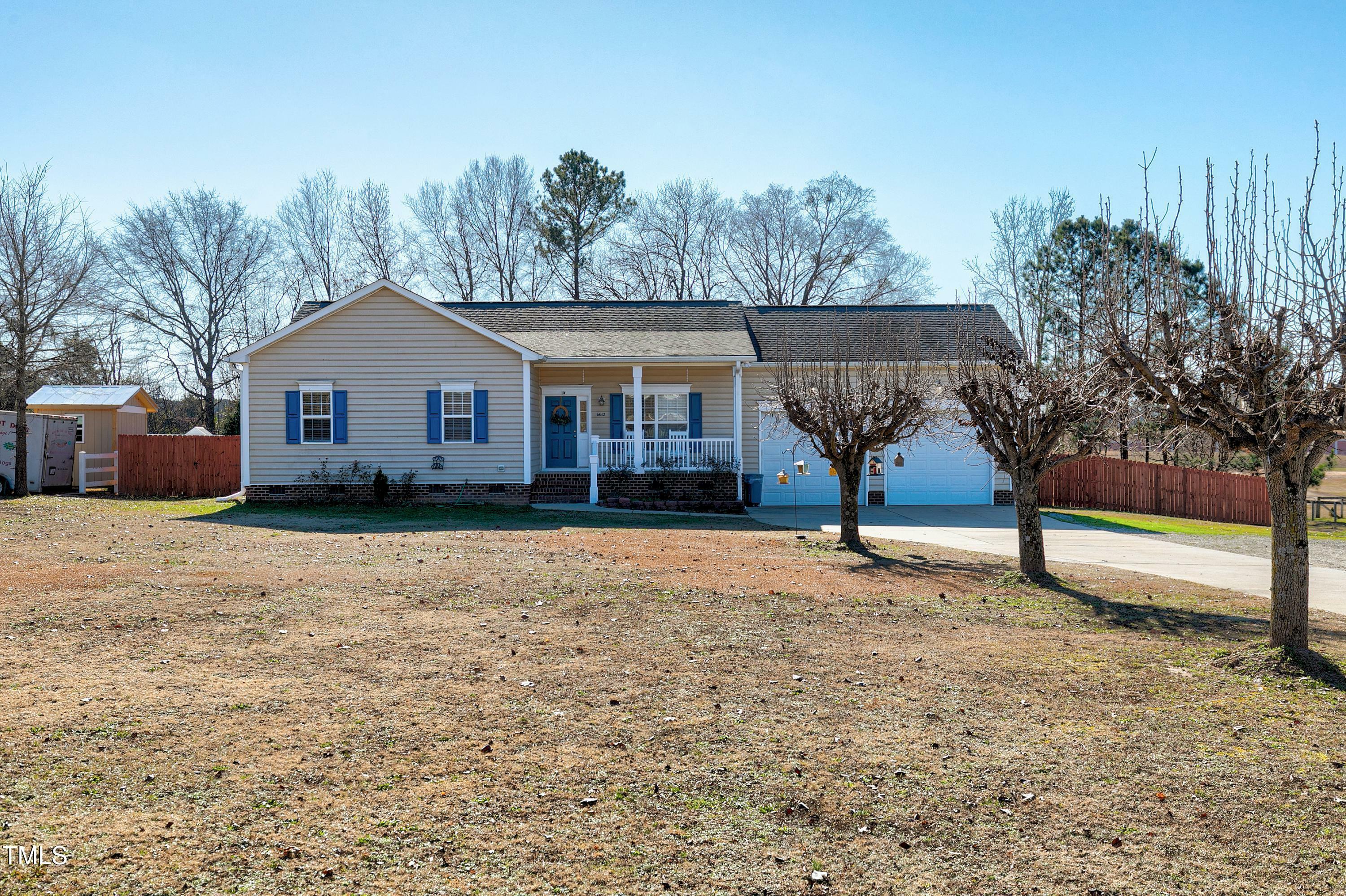 Property Photo:  6612 Ten Ten Road  NC 27539 