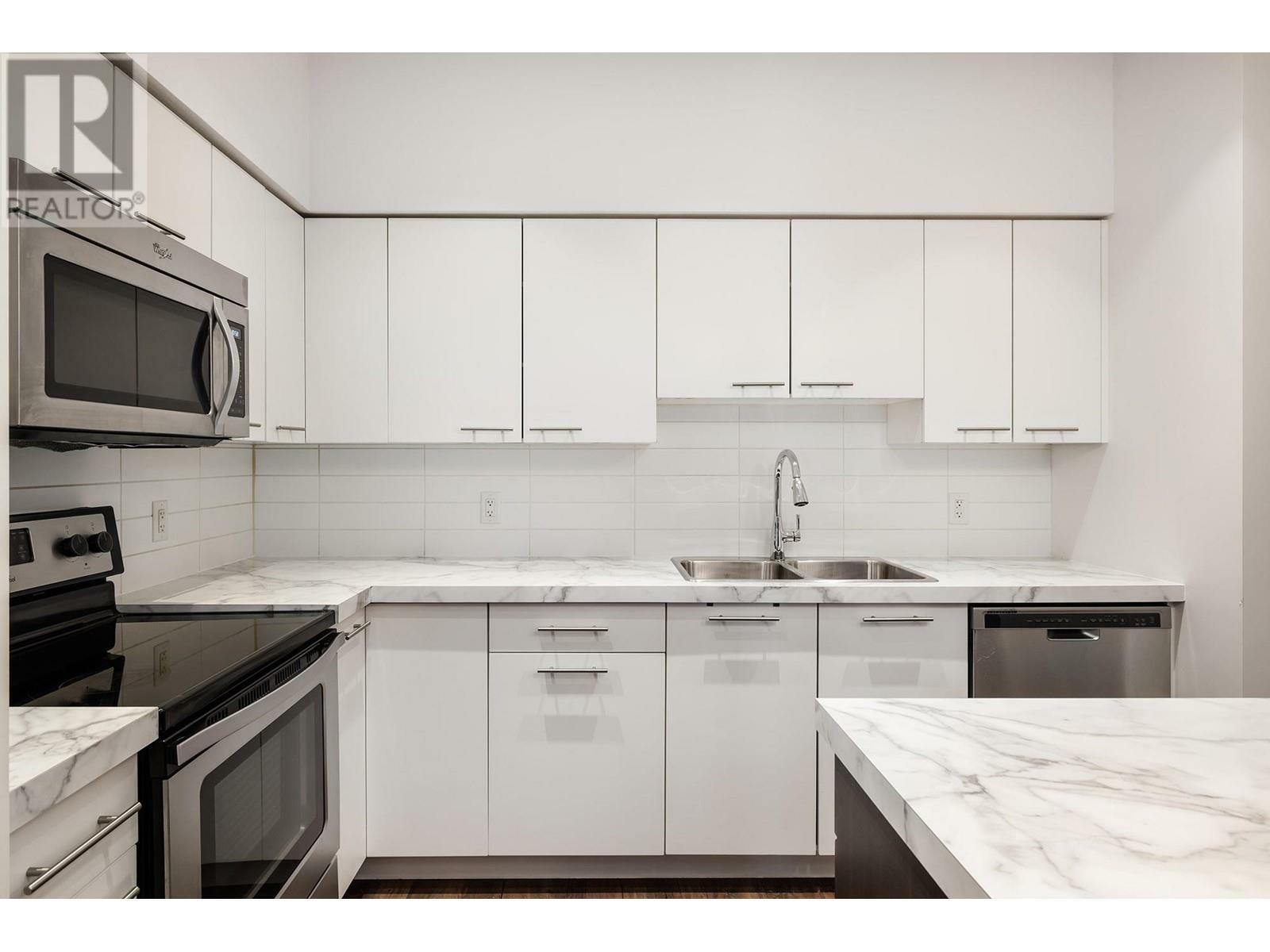 Property Photo: 975 Academy Way 214 BC V1V 3C8