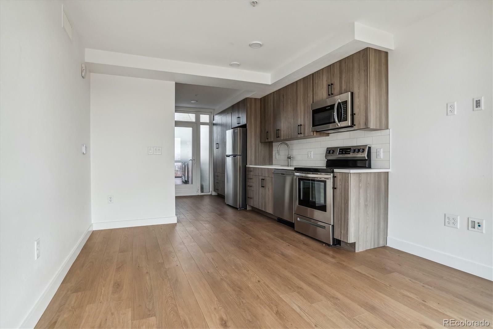 Property Photo: 3575 Chestnut Place 406 CO 80216